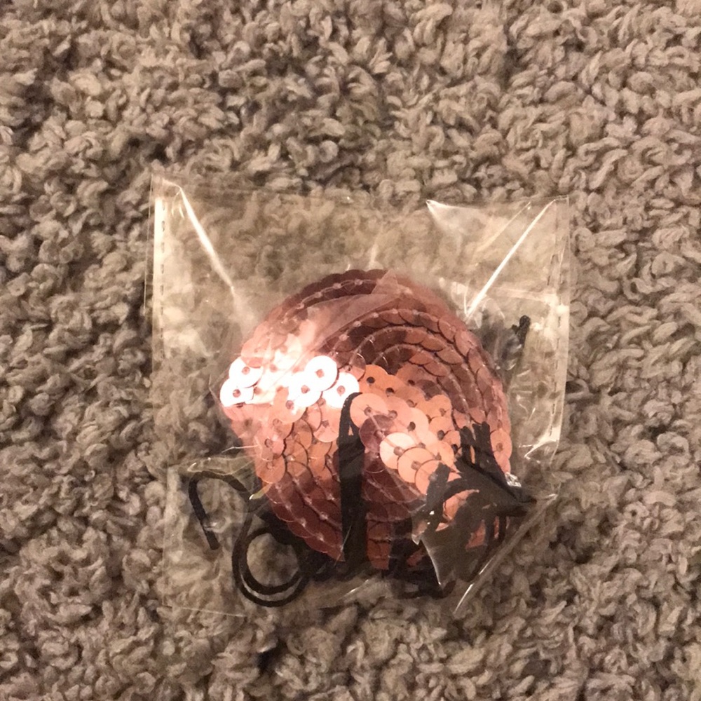 Pink sequin stick pasties with tassels